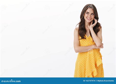 Gorgeous Thoughtful Intrigued Young Fashionable Woman In Yellow Casual