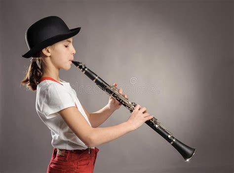 Little Girl Playing Clarinet Stock Photo Image Of Play Talent 107200686