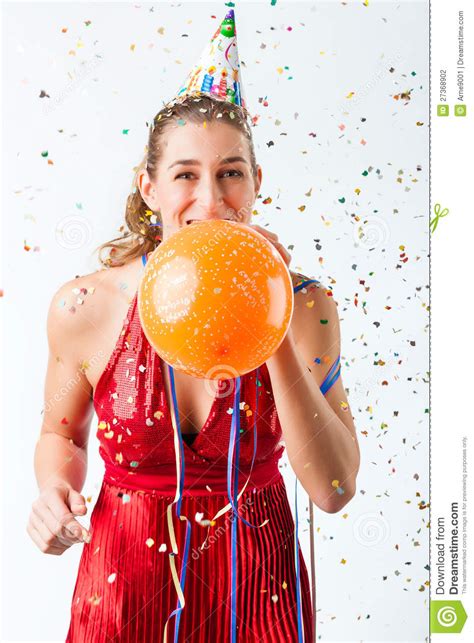 Talking about birthday wishes, we would like to officially welcome you to the hub of one of the finest collections of birthday greetings for a woman. Woman Celebrating Birthday With Balloon Stock Photo ...