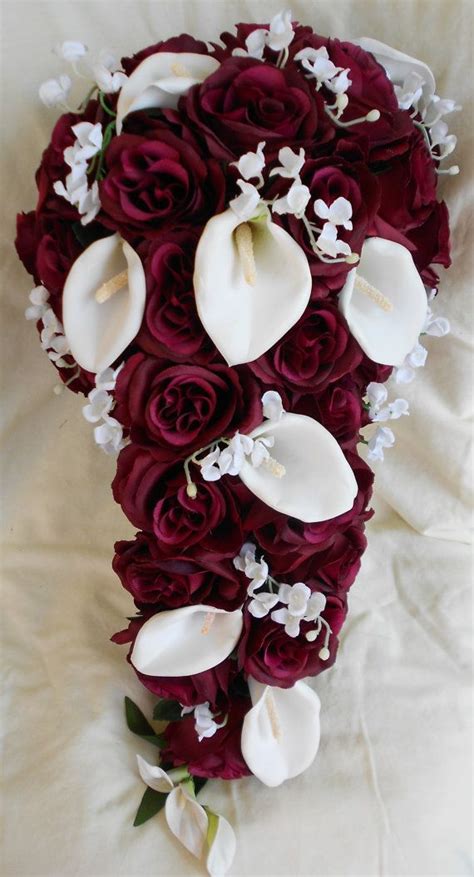 Cascade wedding bouquets with burgundy. Pin by Brenna Larsen on Bodita!! | Rose bridal bouquet ...