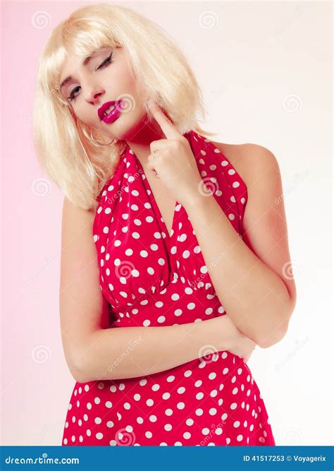 Thoughtful Girl In Blond Wig And Retro Red Dress Winking Pinup Stock Image Image Of