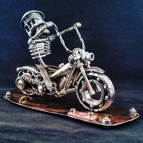Here's a site, metaldude, selling art made from scrap car parts, motorcycle parts and just plain old scrap metal. Custom made scrap metal art harley motorcycle by ...
