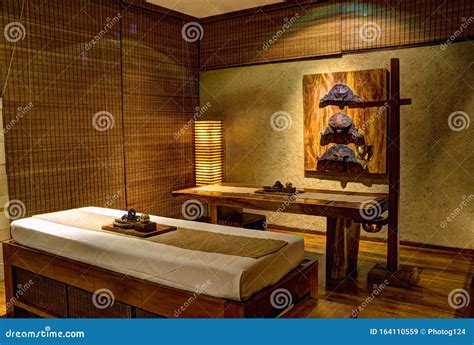 Spa Massage Therapy Room With Massage Therapy Table And Massage Oil Bottles Stock Image Image