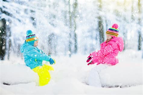 672 Kids Playing Snow Children Play Outdoors Winter Snowfall Stock