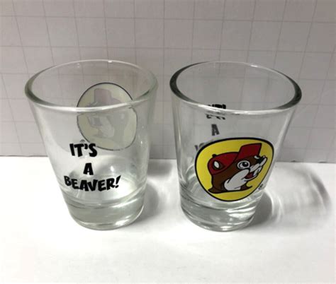 Lot Of 2 Standard Shot Glasses Buc Ees Its A Beaver Bucky The