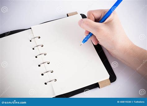 A Hand Is Writing On Blank Page Stock Photo Image Of Paper Notebook
