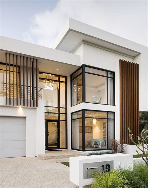This Stunning Contemporary Two Storey Home Has Been Shaped To Fit The
