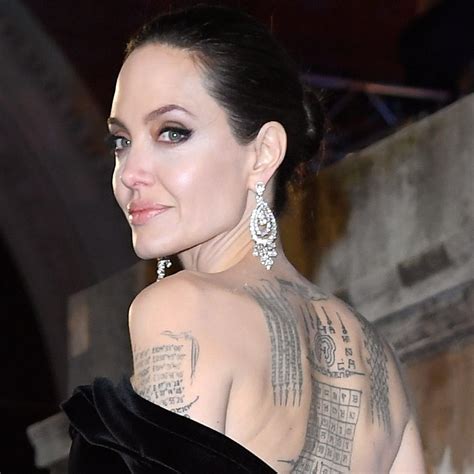Details More Than 77 Angelina Jolie Wanted Back Tattoo Esthdonghoadian