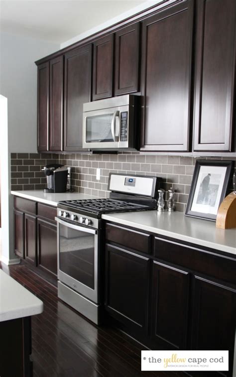 Grout color can also be used to call. The Yellow Cape Cod: Dark Tile, Light Grout Kitchen Backsplash