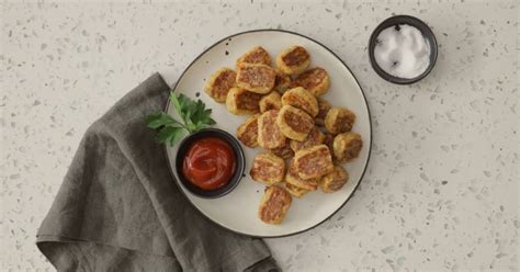 Cauliflower is much more than broccoli's paler cousin: Cheesy Baked Cauliflower Tots | Recipe in 2020 (With ...