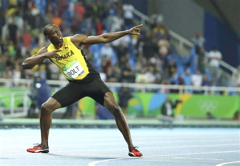 Download Usain Bolt Strikes Iconic Pose Wallpaper