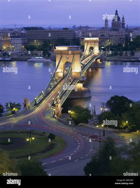 Chain Bridge Over The River Danube And St Stephens Basilica Budapest