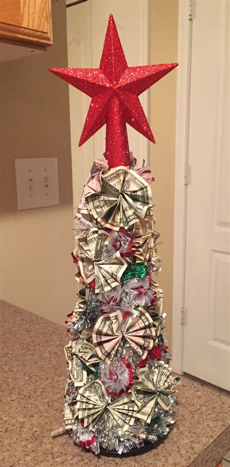 This money origami project is relatively easy. Money Christmas Tree | Christmas tree, Holiday decor ...