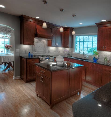 1.we have various door and carcass for selection,our kitchen cabinets are customized by customers. Dark maple cabinets, black granite tops and travertine ...