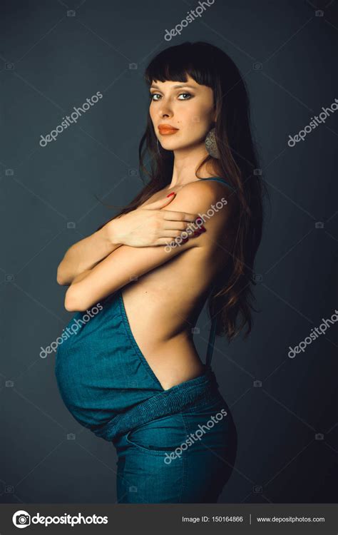 Pregnant Woman In Overalls Stock Photo Lanarus Foto