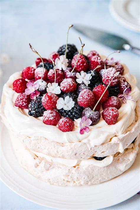 Mary's pavlova is topped with pretty berries, but most fruits work well. Double Stacked Berry Pavlova #pavlova #meringue | Pavlova ...