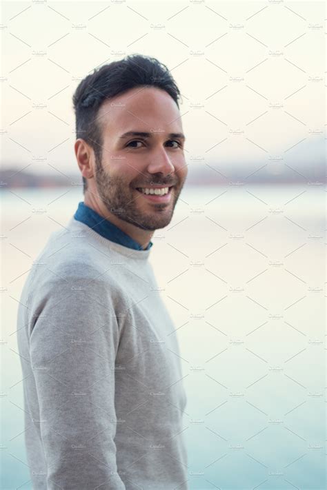 portrait of a handsome guy smiling high quality people images ~ creative market