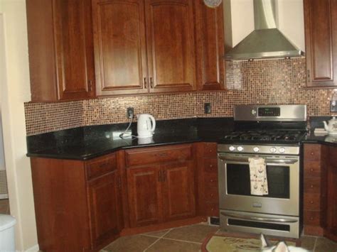 If you already have a granite countertop, you may be wondering what backsplash tile looks best? Backsplash With Cherry Cabinets | Cherry bright, Cherry ...