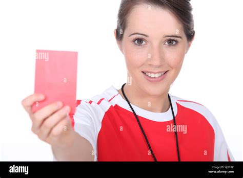 Female Soccer Referee Holding Out Red Card Stock Photo Alamy