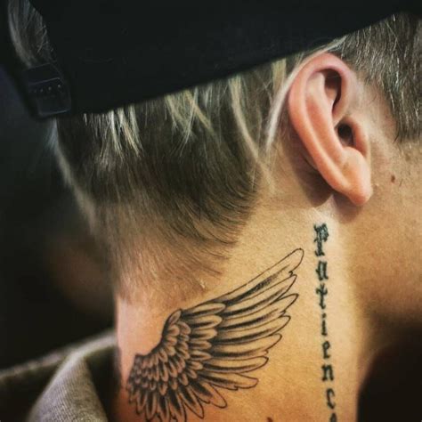 Justin Biebers Wings Tattoo On The Back Of His Neck Best Neck