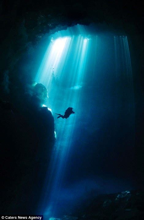 Scuba Diver Photographs An Ancient Mayan Sinkhole In Quintana Roo In