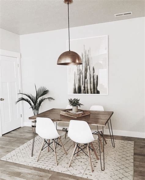This dining room table decor beautifully matches the rest of the room. Pin on Dining rooms