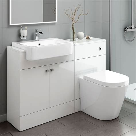 It looks sleek because the sink is inbuilt into the frame of the unit, with the pipes concealed behind. 1160mm Harper Gloss White Combined Vanity Unit - Lyon Pan ...