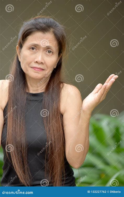 Undecided Filipina Female Senior Woman Stock Photo Image Of Older Elder