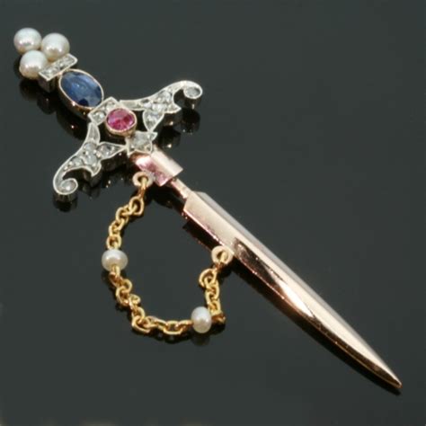 Victorian Dagger Or Sword Shaped Bejeweled Gold Lapel Pin Description
