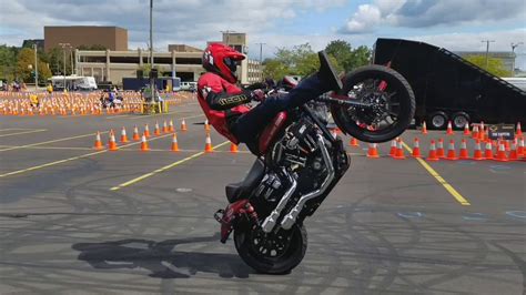 Experienced riders don't get excited. Motorcycle stunt riders perform feats in Flint - YouTube