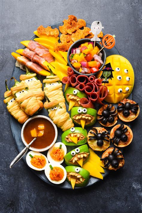 Top with candy corn and serve with graham crackers and vanilla wafers for dipping. Easy Halloween Food Ideas - With Video! - Foxes Love Lemons