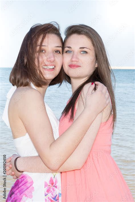 Close Up Lifestyle Fashion Portrait Of Two Pretty Fresh Young Lesbian