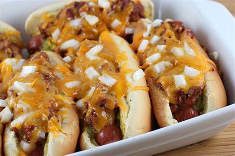 Add a hot dog to each bun and top with about 3 tablespoons of baked beans. Baked Hot Dogs Recipe - BlogChef