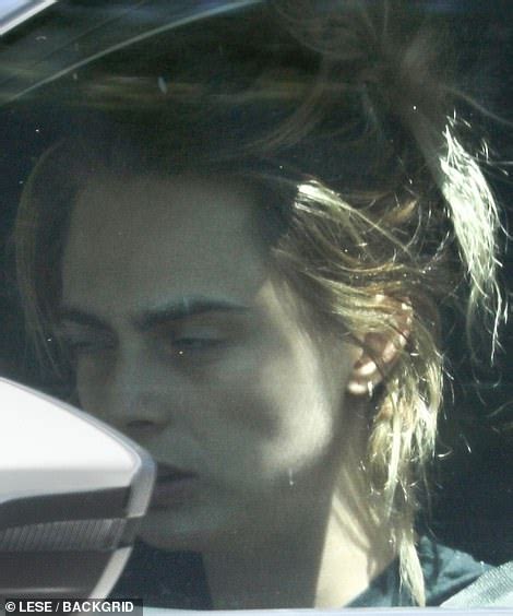 Cara Delevingne Looks Out Of Sorts While Smoking And Taking Drops Of An