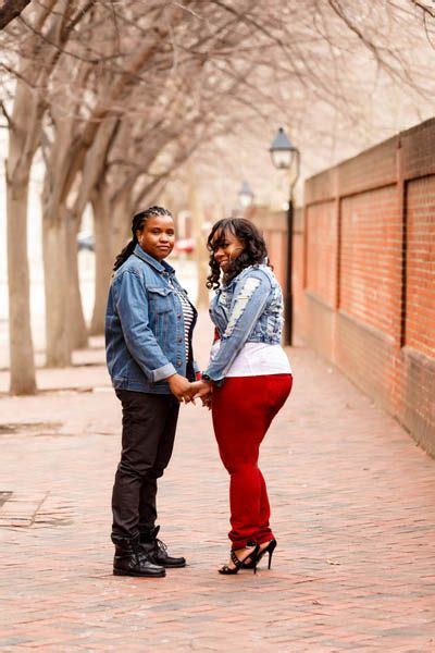 sweet philadelphia engagement session with energetic pops of red equally wed lgbtq wedding
