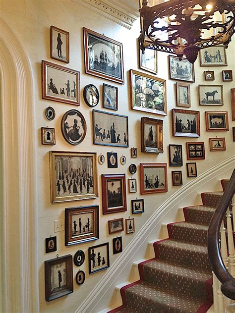 A Collection Of Silhouettes Provides The Decor In The Stair Hall Of