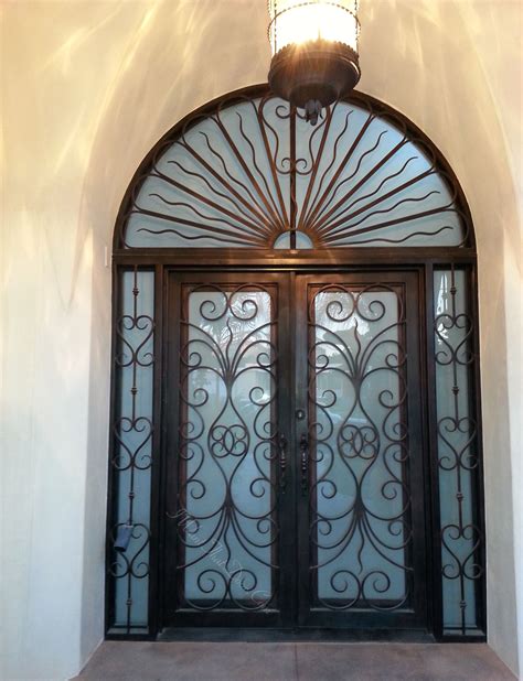 Revenna Wrought Iron Double Door With Sidelights And Transom Installed By UID Call Now And G