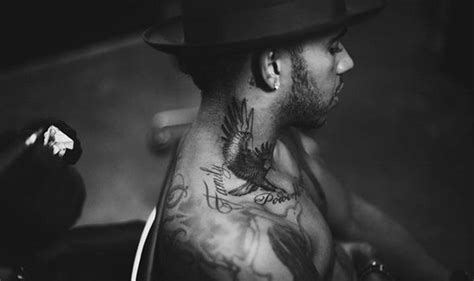 I'm either loved or hated. Lewis Hamilton proudly displays large new eagle tattoo and ...