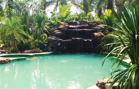 Pool Waterfall Construction And Tropical Garden At Fishing Resort In