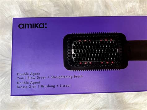 Amika 2 In 1 Blow Dry Straightening Brush Is A Double Agent With Two