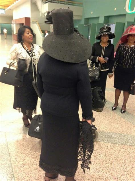 Back Shot Of Mother Mary Tucker In Black Louise D Patterson Couture