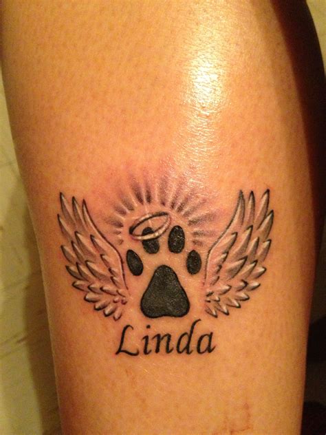Tattoo in memory of my dog Linda | Dog memorial tattoos, Pawprint