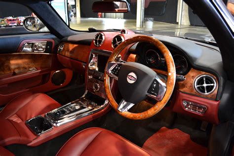 Black And Red Car Steering Wheel Luxury Cars Car The Premier Group