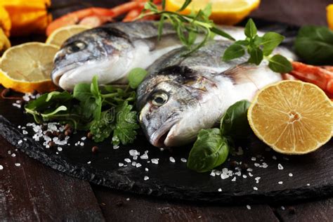 Delicious Fresh Fish Fish With Aromatic Herbs Spices And Vegetables