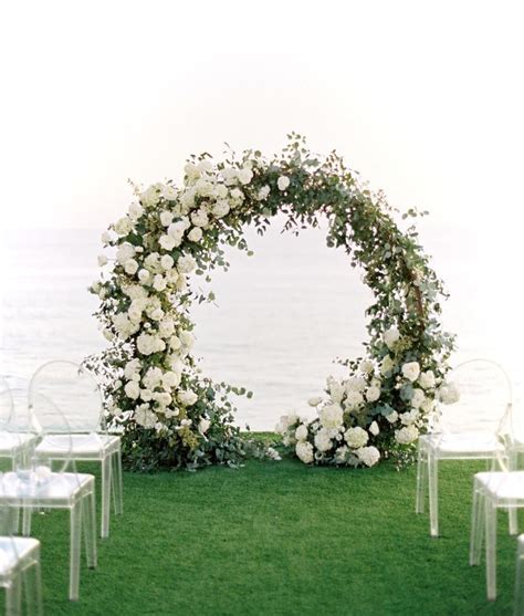 Beautiful Modern Circle Arch With Lush White Blooms And Organic