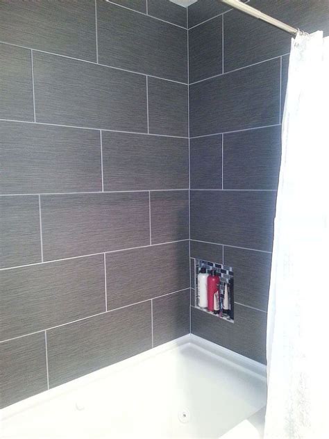 Discover rustic to modern tiling patterns with the top 60 best grey bathroom tile ideas. Small Master Bathroom Makeover | Tile tub surround, Small ...