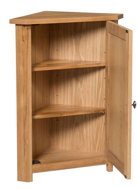 With two exposed shelves and a cupboard featuring an additional, adjustable shelf, this unit offers plenty of storage perfect for smaller rooms and accommodation. Compact Corner Cupboard - Ideal for Smaller Spaces | Hallowood