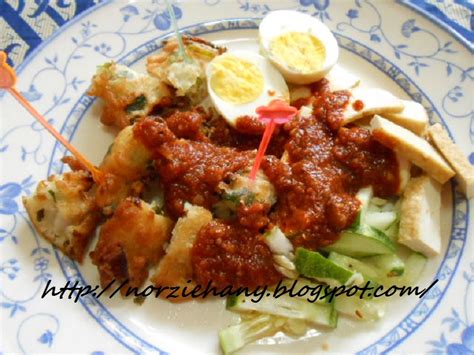 Bila semua bahan tadi telah dikisar, masukkan dalam periuk dan masukkan 4 cawan air dan masak. Norzie hany: Kuah Passembur/Rojak Mamak