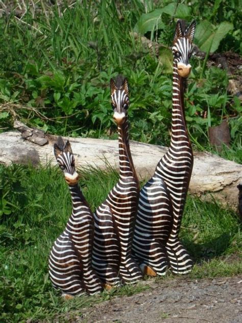 A beautiful, well maintained and well cared for bird garden and animal park. Fairtrade Set Of 3 Wooden Sitting Zebra Statues | Fair ...