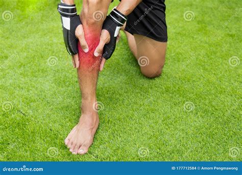 Close Up On Shin Injury The Man Use Hands Hold On His Shin While